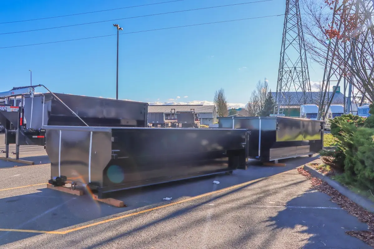 Roll-off dumpster ready for waste disposal at job site for 3 Yard Dumpster Rental in Saco
